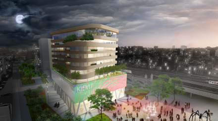 Nachtimpressie van het nieuwe gebouw van de Persgroep Publishing aan het station